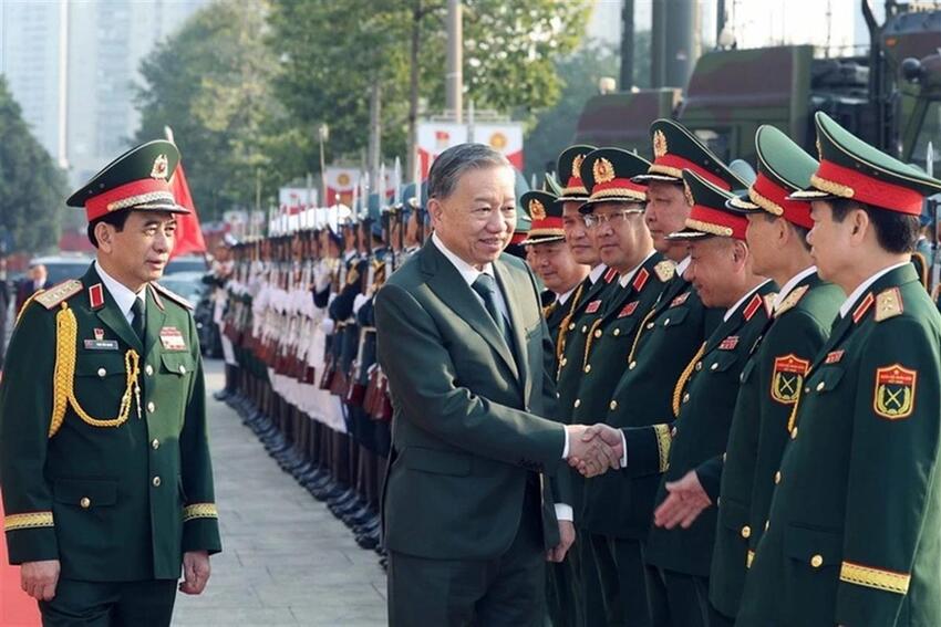 "Quân đội nhân dân vững bước dưới cờ Đảng quang vinh"