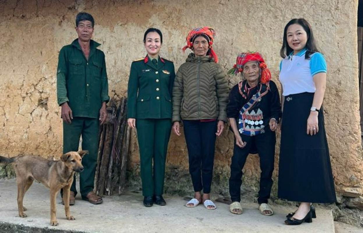 A group of people standing together with a dog AI-generated content may be incorrect.
